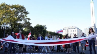 ФОТО. В Риге прошло шествие белорусской диаспоры в честь годовщины массовых протестов