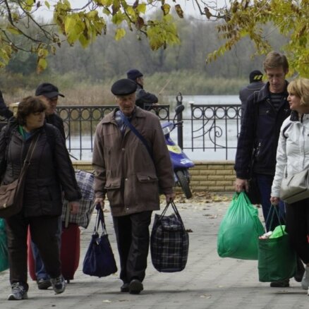 "У нас будет бойня, мы готовы". Кто остается в Херсоне и кто его покидает
