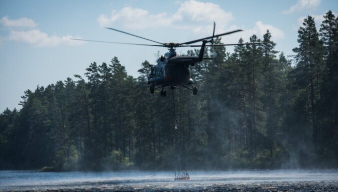 В тушении пожара в Валдгалской волости больше не требуется помощь белорусского вертолета