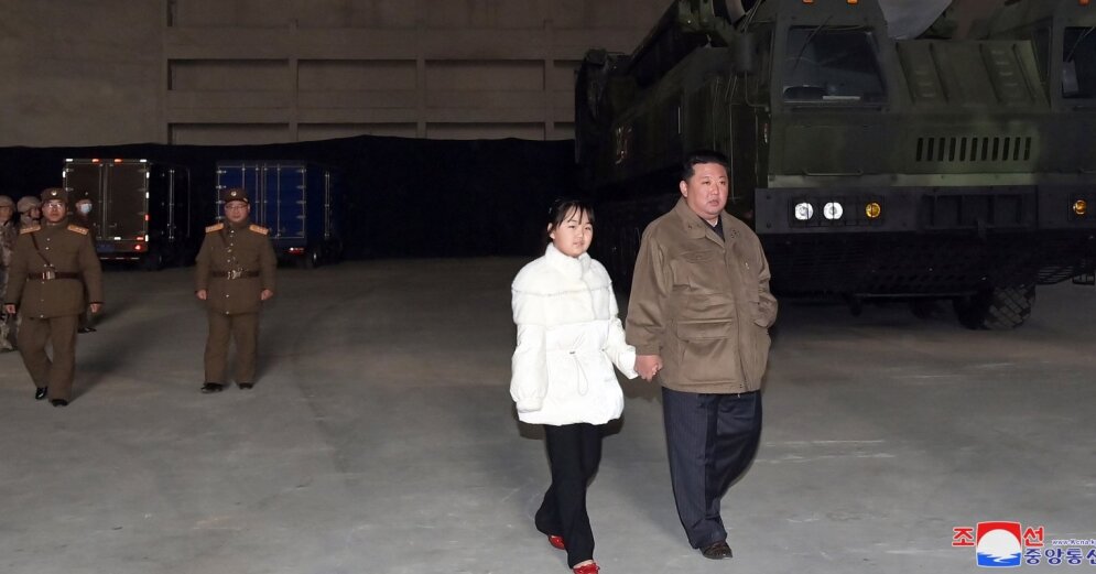 Photo: Kim Jong-un watches the rocket launch with his daughter