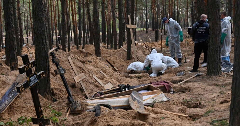 263 bodies were exhumed from the mass grave