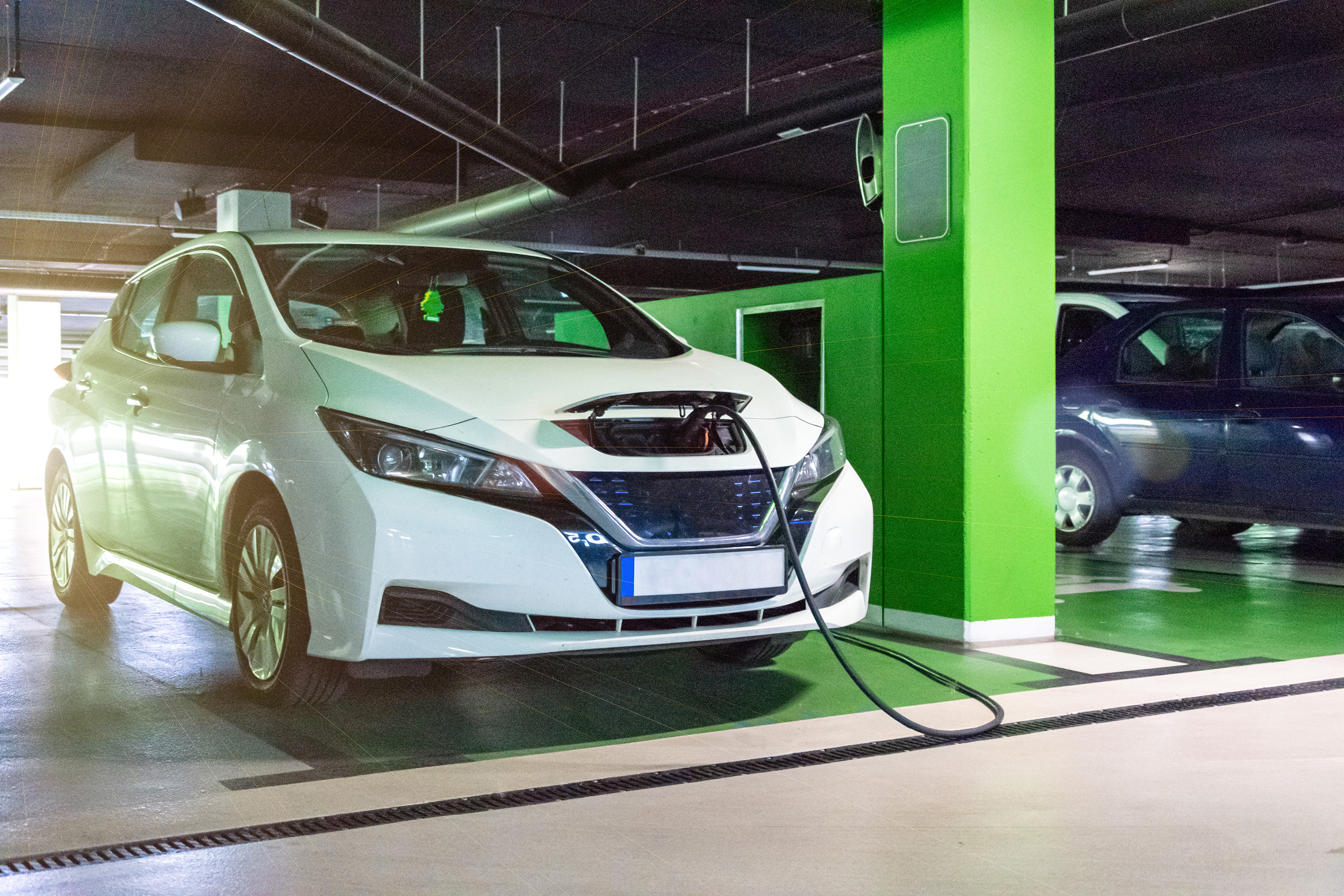 A picture containing indoor, green, car Description automatically generated
